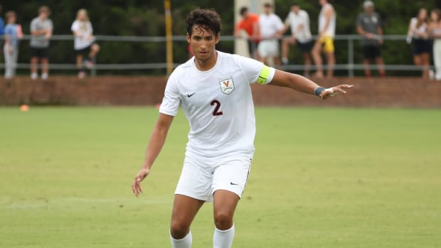 William Citron looks to pass the ball during the Virginia men's soccer match against Iona at Klockner Stadium.